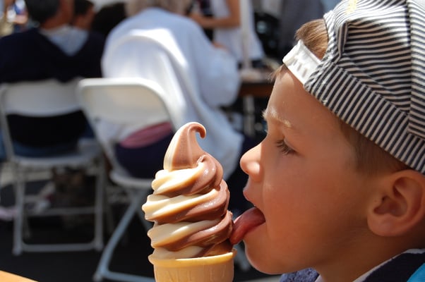 Kid Licking Ice Cream