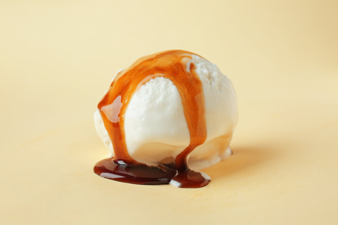 Ice Cream Scoop with Caramel Syrup